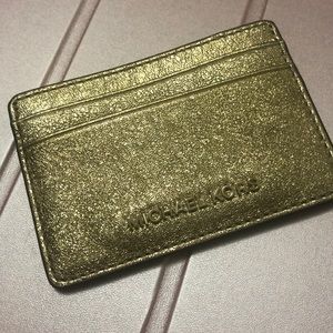 Brand New Michael Kors gold leather card holder